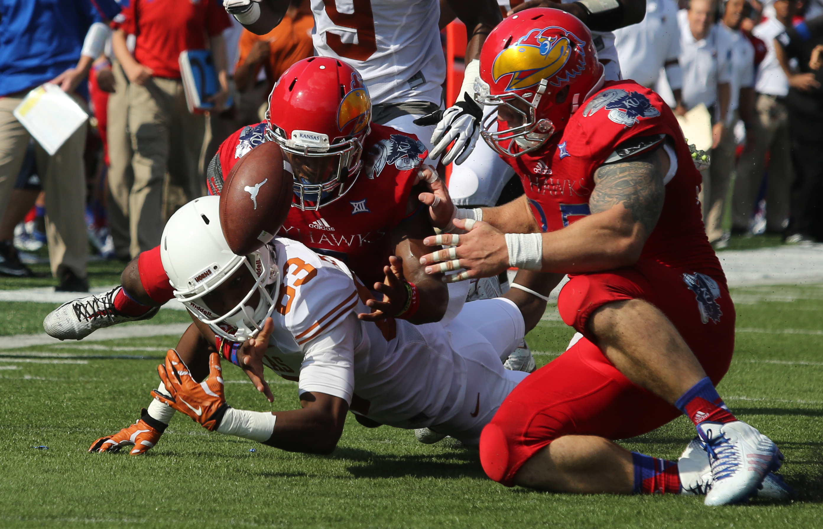 Swoopes TDs, 4 picks help Texas blank Kansas 23-0