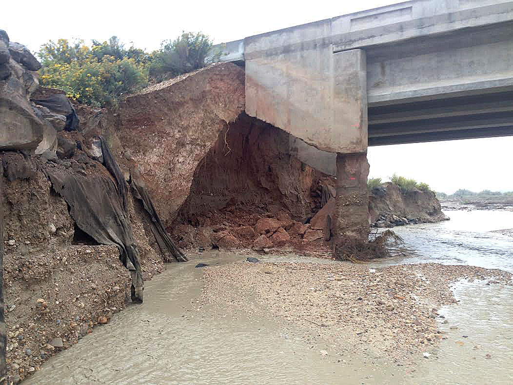 A couple crashed into the Paria River Saturday night after heavy flooding caused the ground beneath the blacktop to erode. (Photo: Garfield County Sheriff's Office)