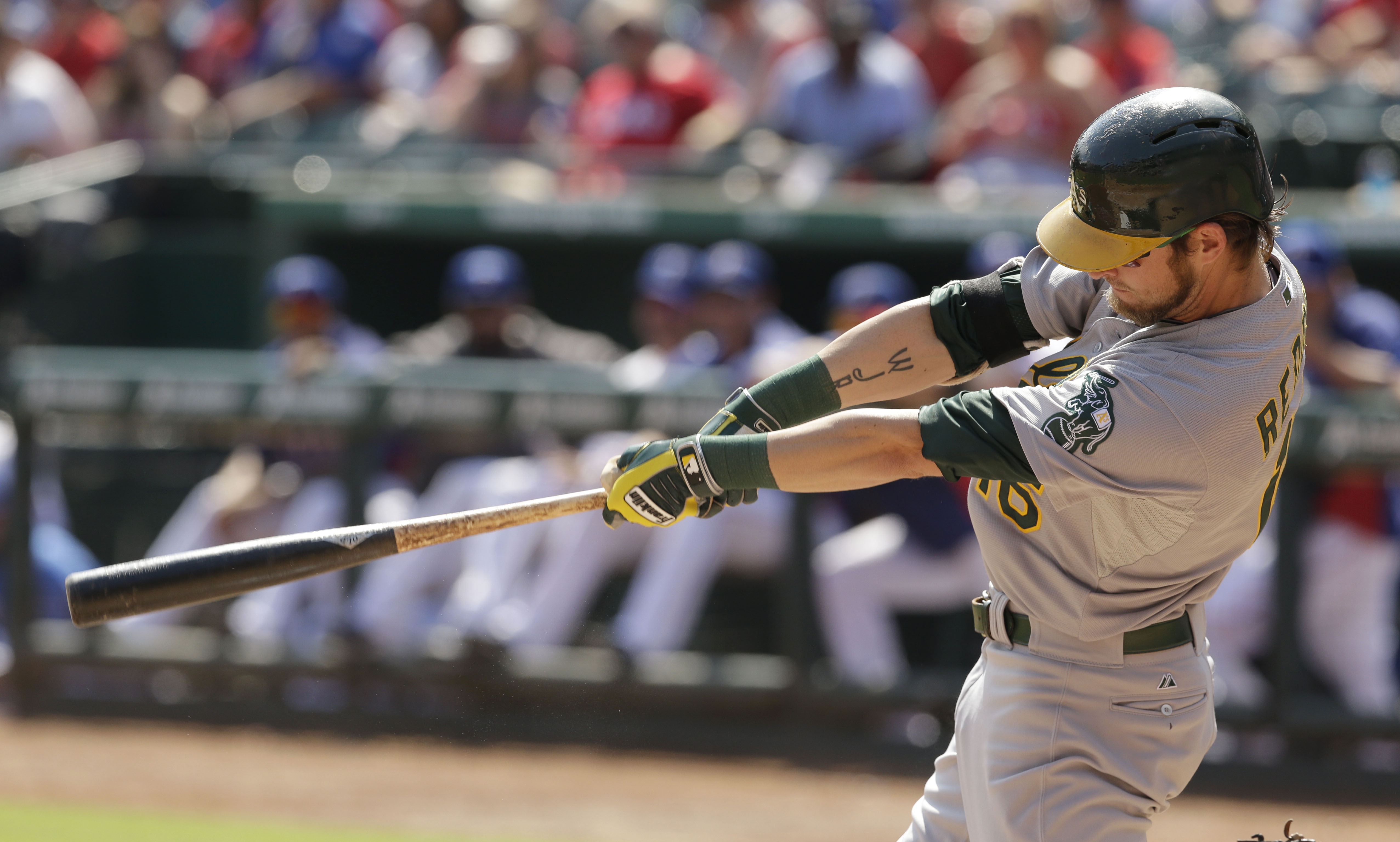 A's clinch AL wild card with 4-0 win at Texas