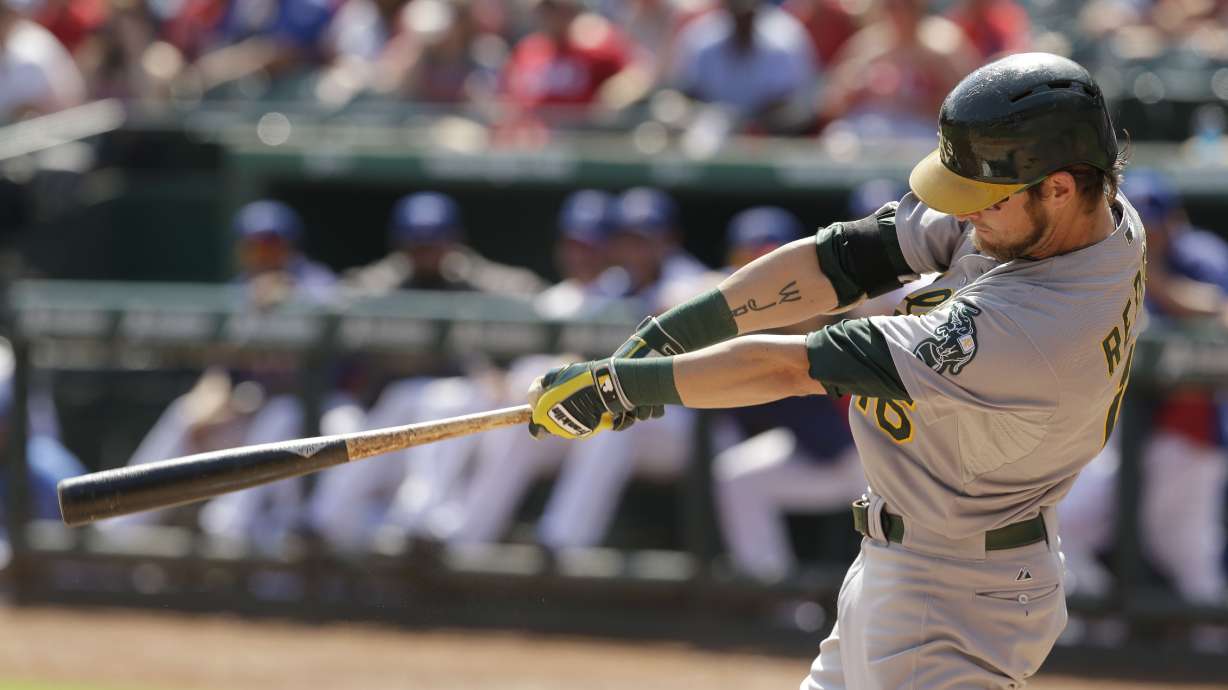 A's clinch AL wild card with 4-0 win at Texas