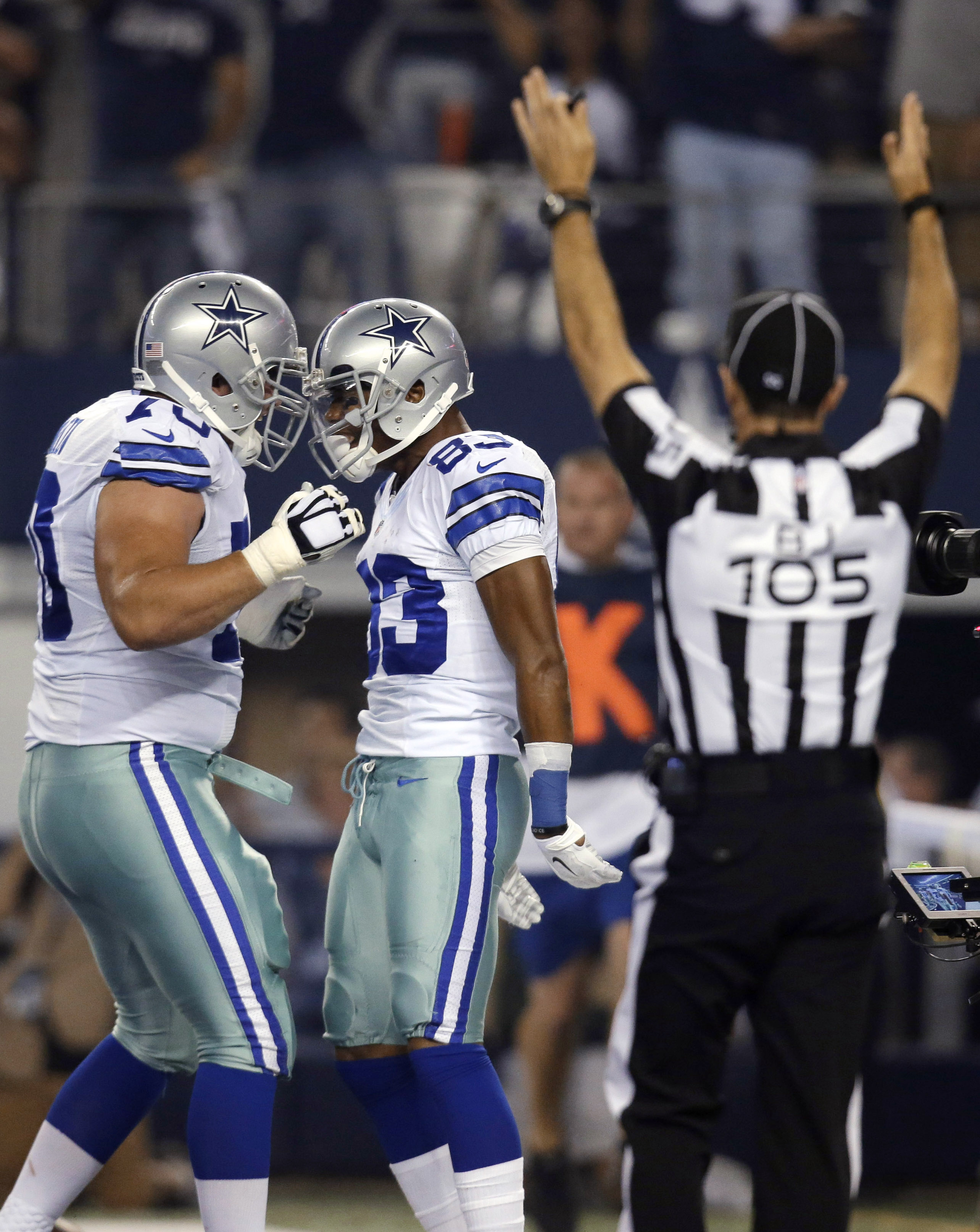 Romo, Murray lead Cowboys past Saints 38-17