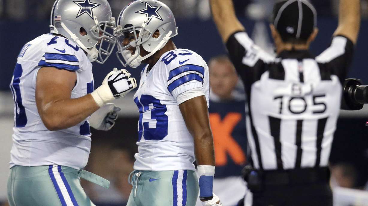 Romo, Murray lead Cowboys past Saints 38-17
