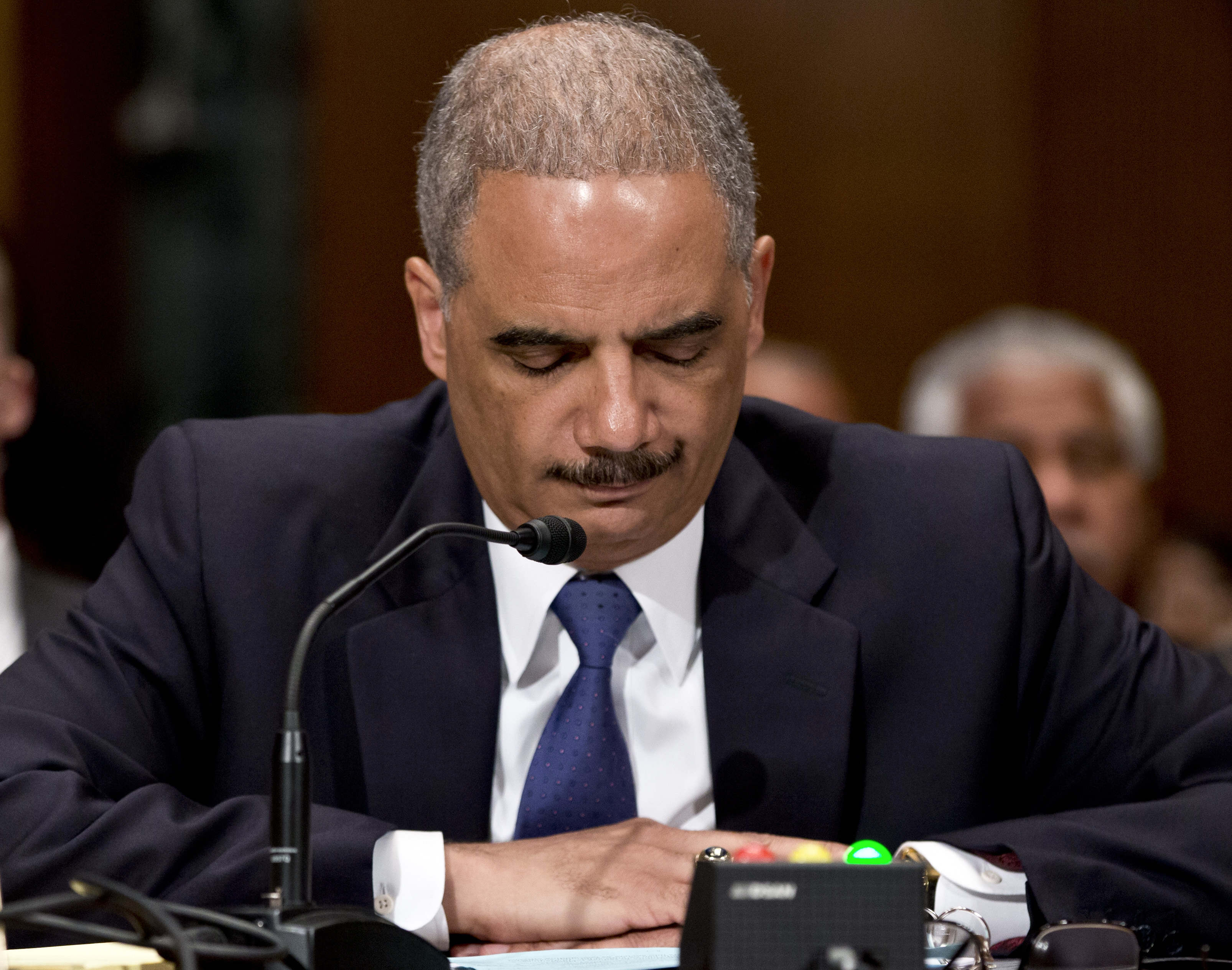 Holder: Mixed record on national security issues