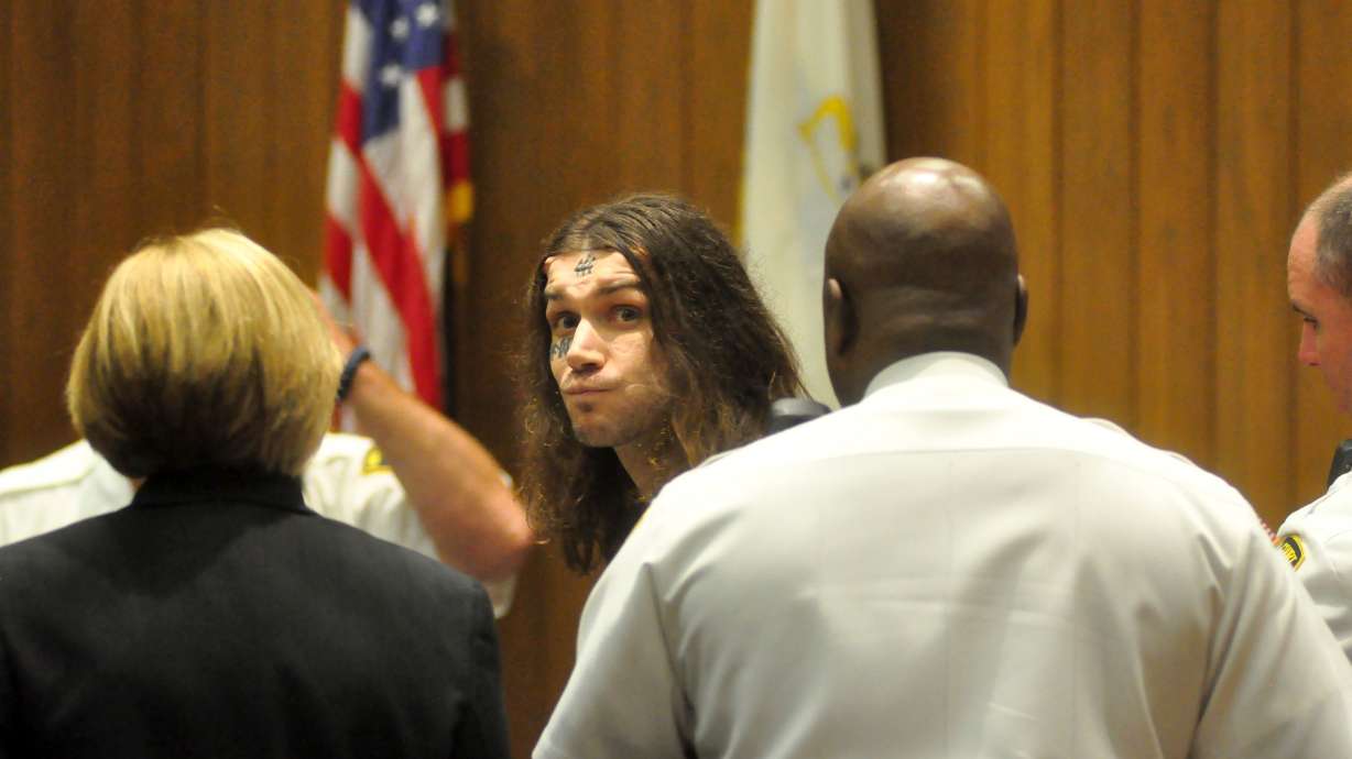 Man with implanted horns gets life for 3 killings