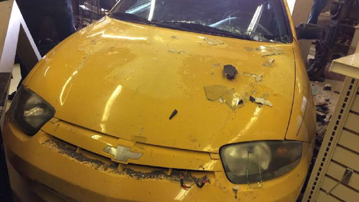 Car crashes into pawn shop