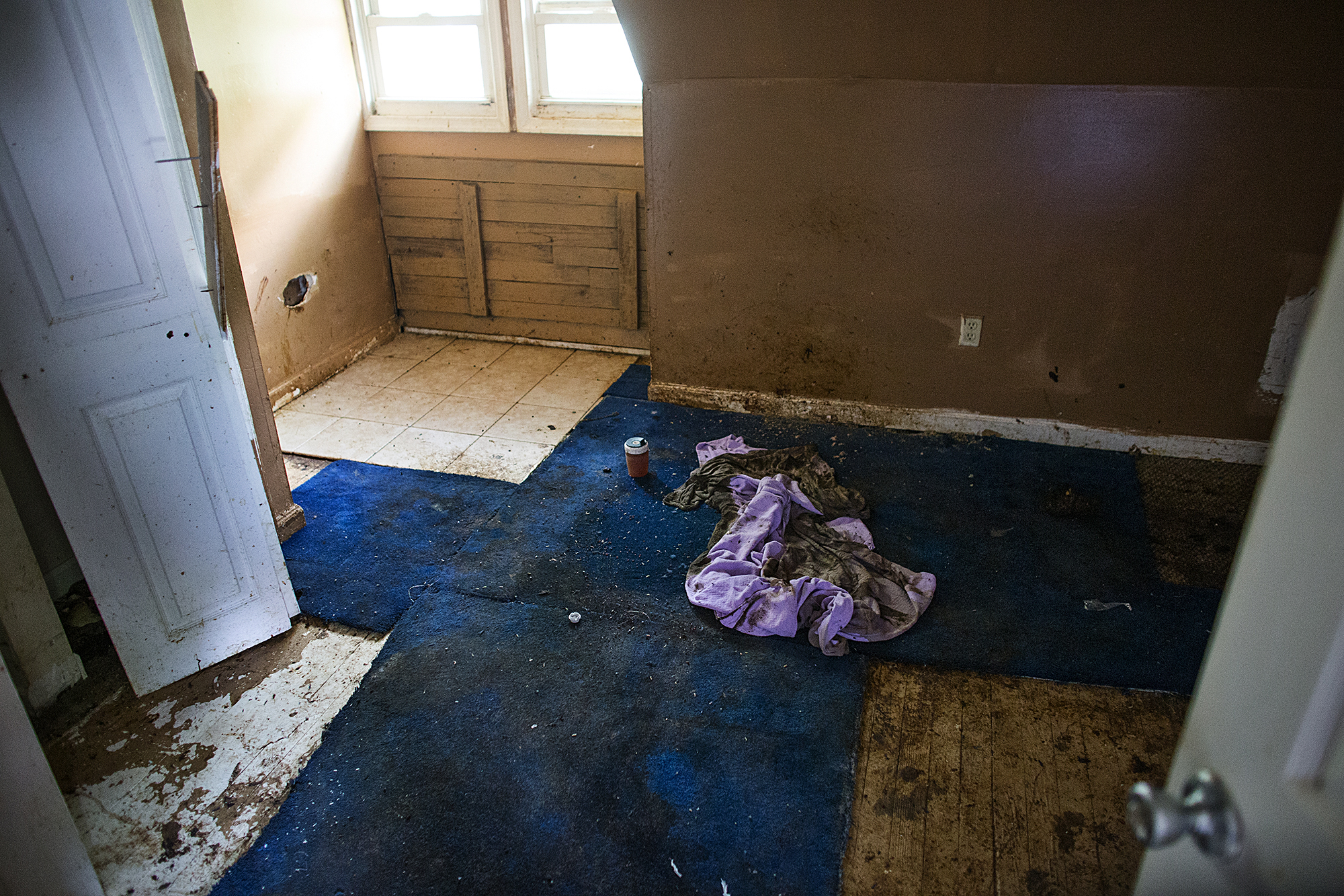 Parents charged in death of son found in home