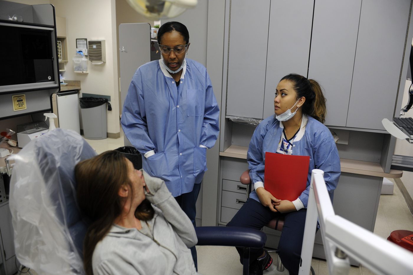 Public defender pays for arrestees' dental care