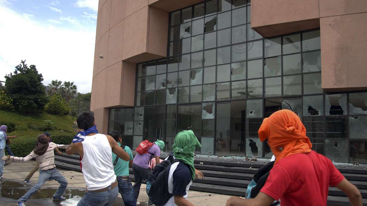 Mexico says 14 of 57 missing students found