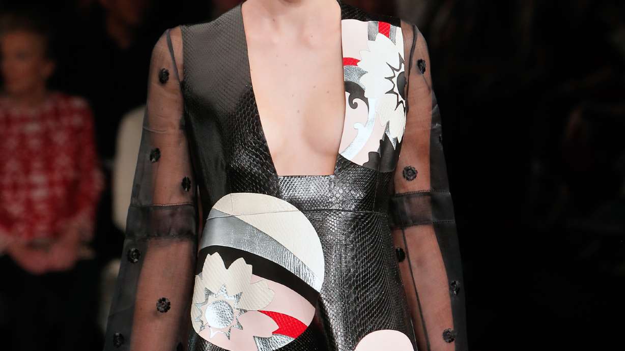 Luhrmann, Gisele hit Chanel's Parisian boulevard