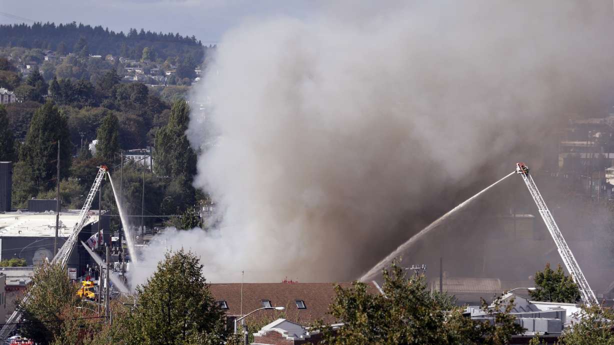 Large fire burns, releases chemicals in Seattle