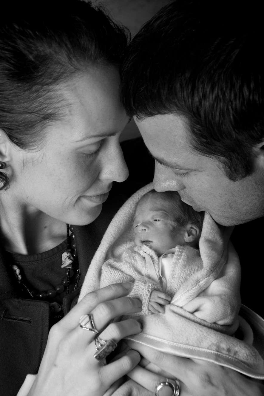 Kathy and Nate Taylor hold their son, Luke Tazelaar Taylor. He was delivered early so Kathy could begin cancer treatment. Luke died Saturday. Credit: Amy Hales, Now I Lay Me Down to Sleep photography