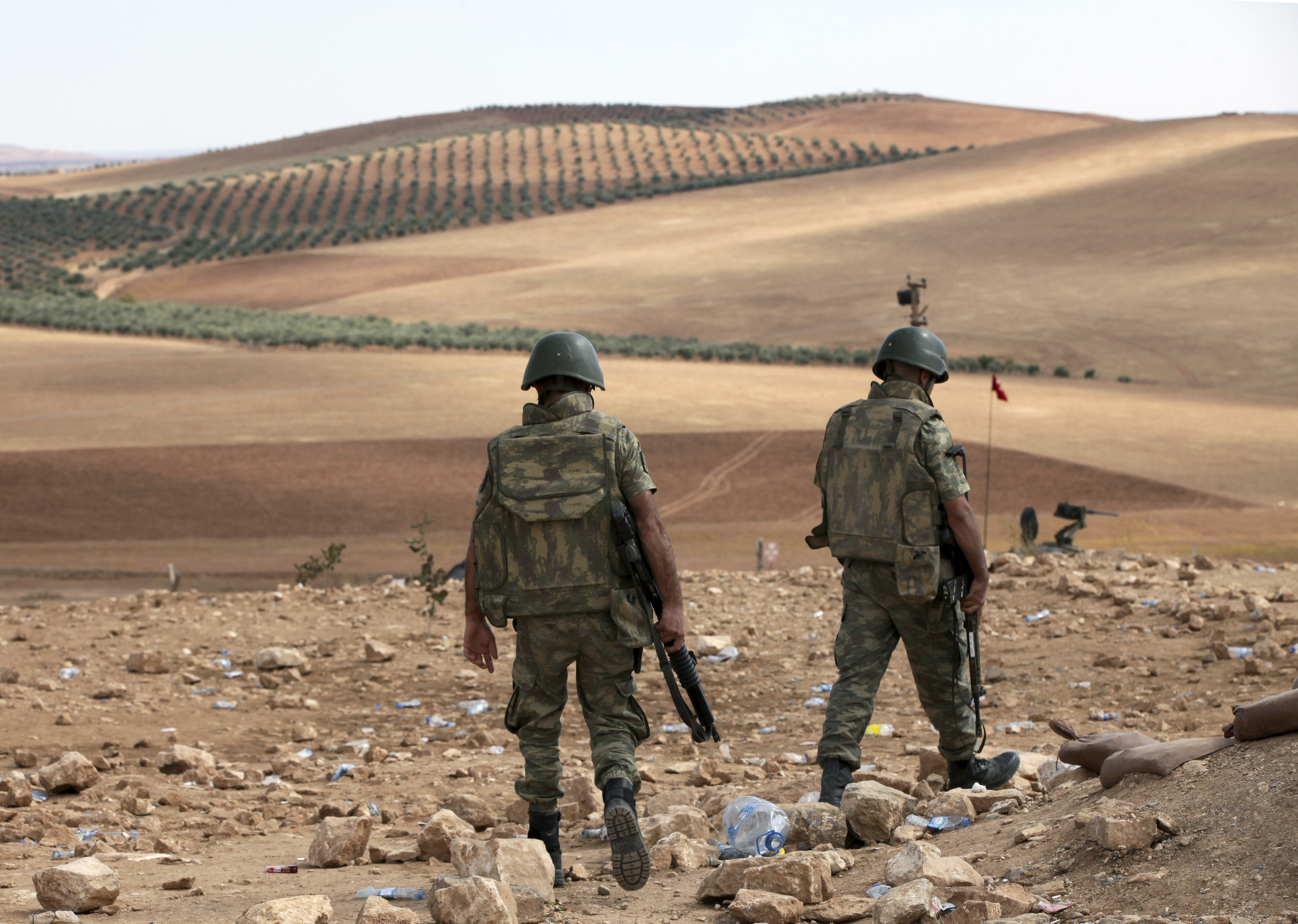 Syria blasts at school kill 32, including 10 kids