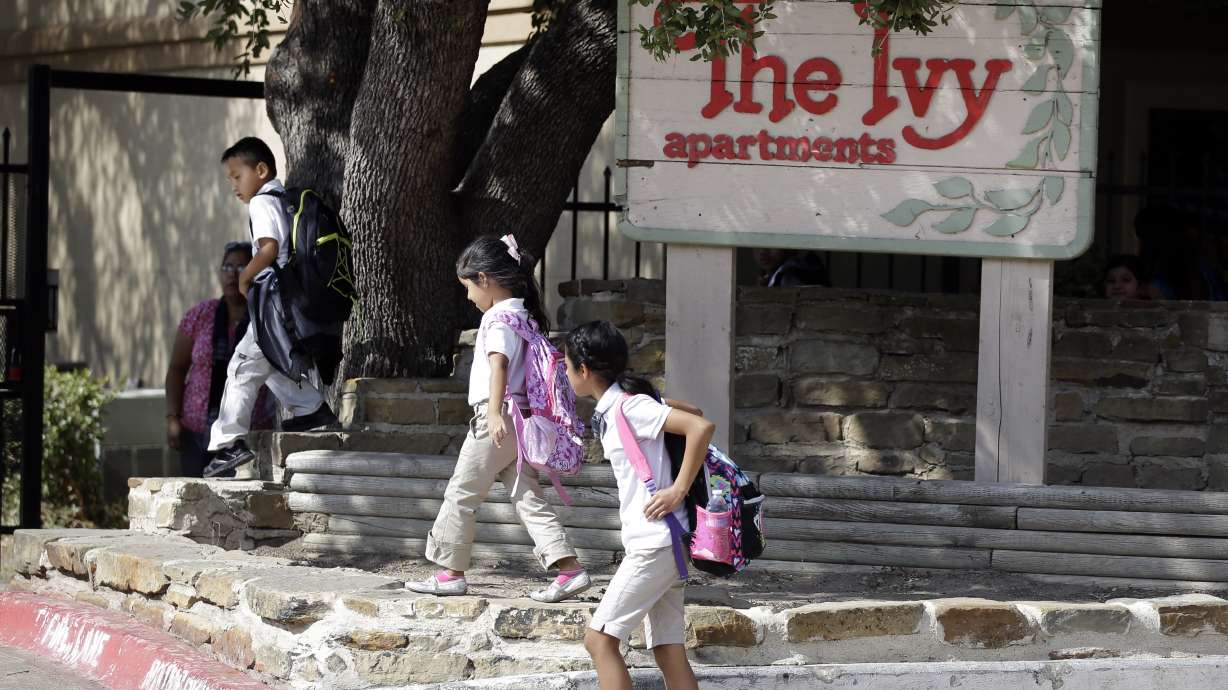 Family that hosted Ebola patient confined to home