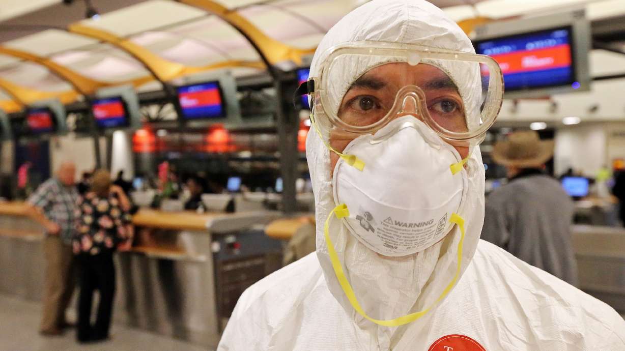 Jet flier dons protective gear in airport protest