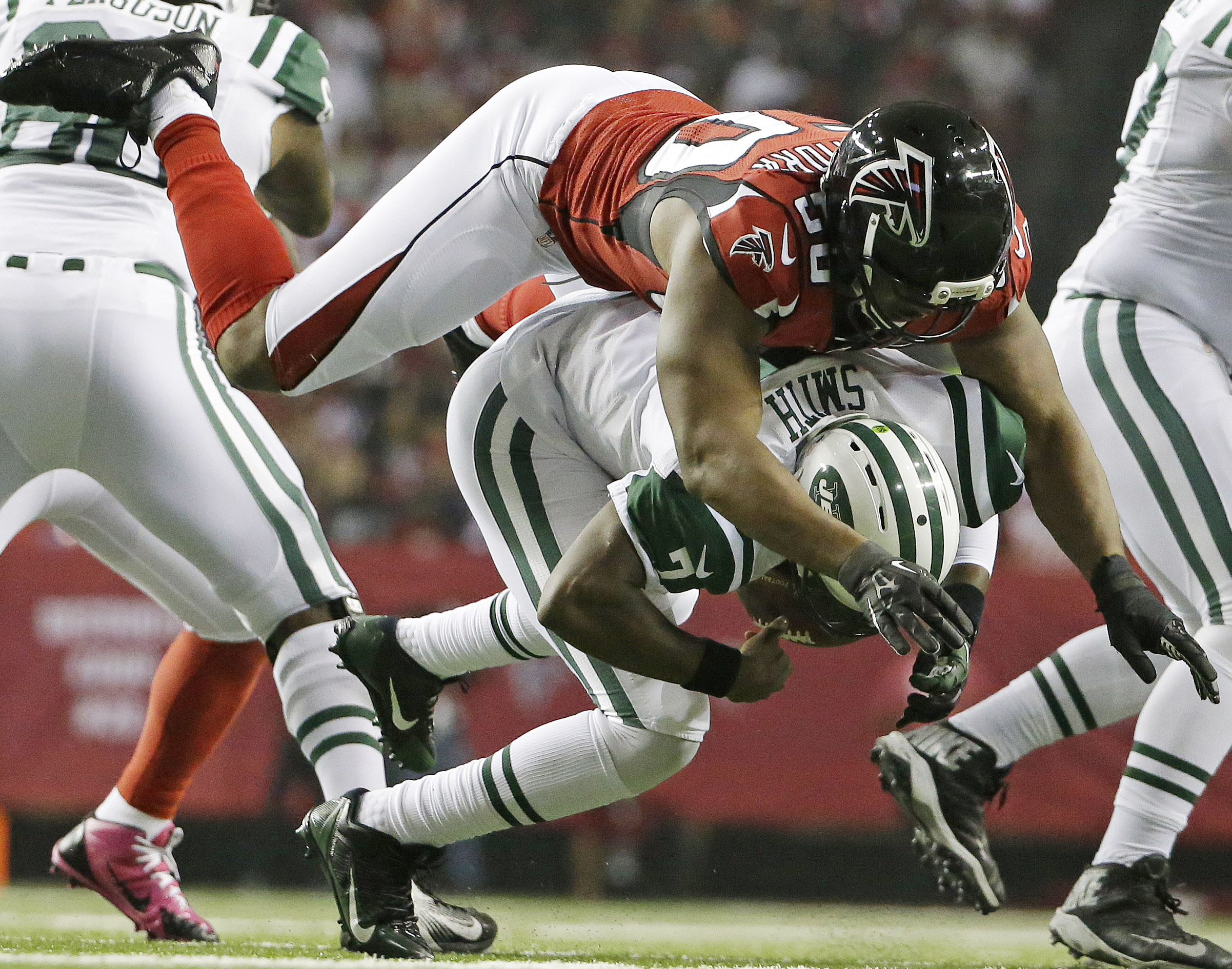 Strange times: Umenyiora takes on his former team