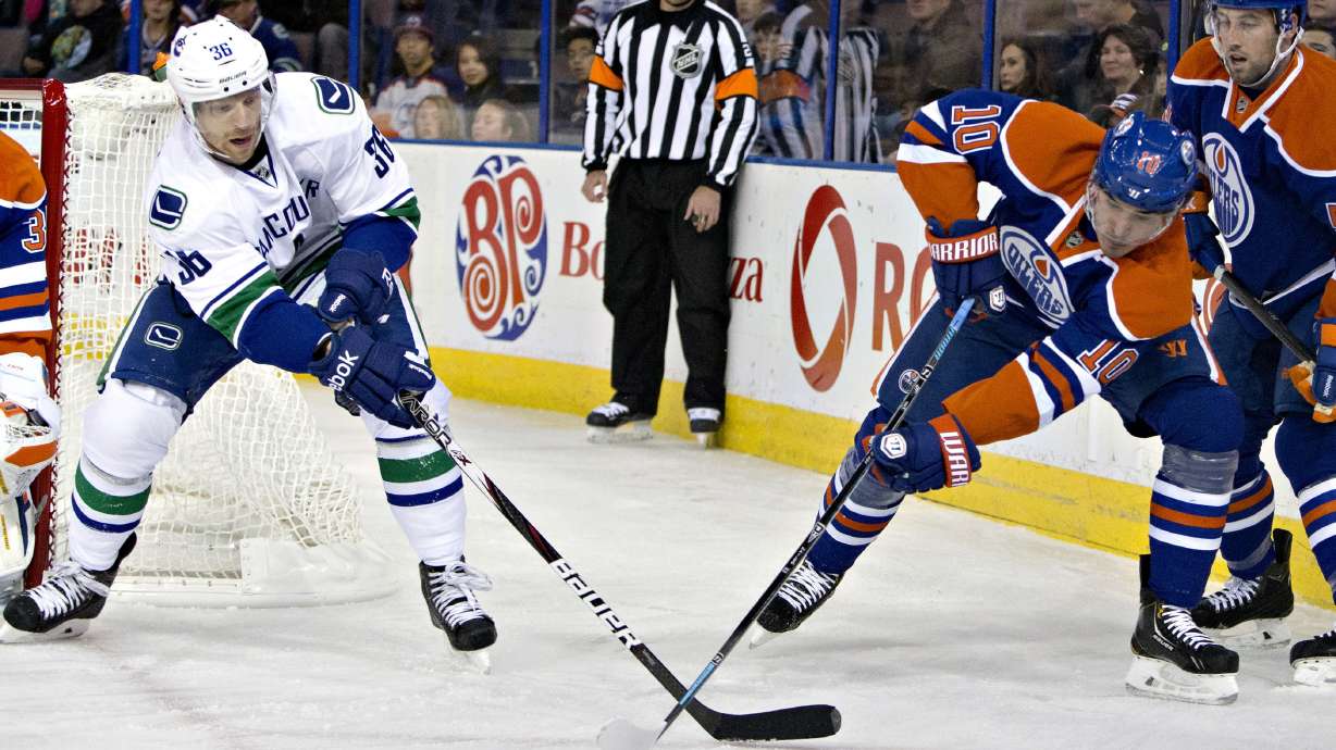 Edler has goal, assist as Canucks beat Oilers 2-1