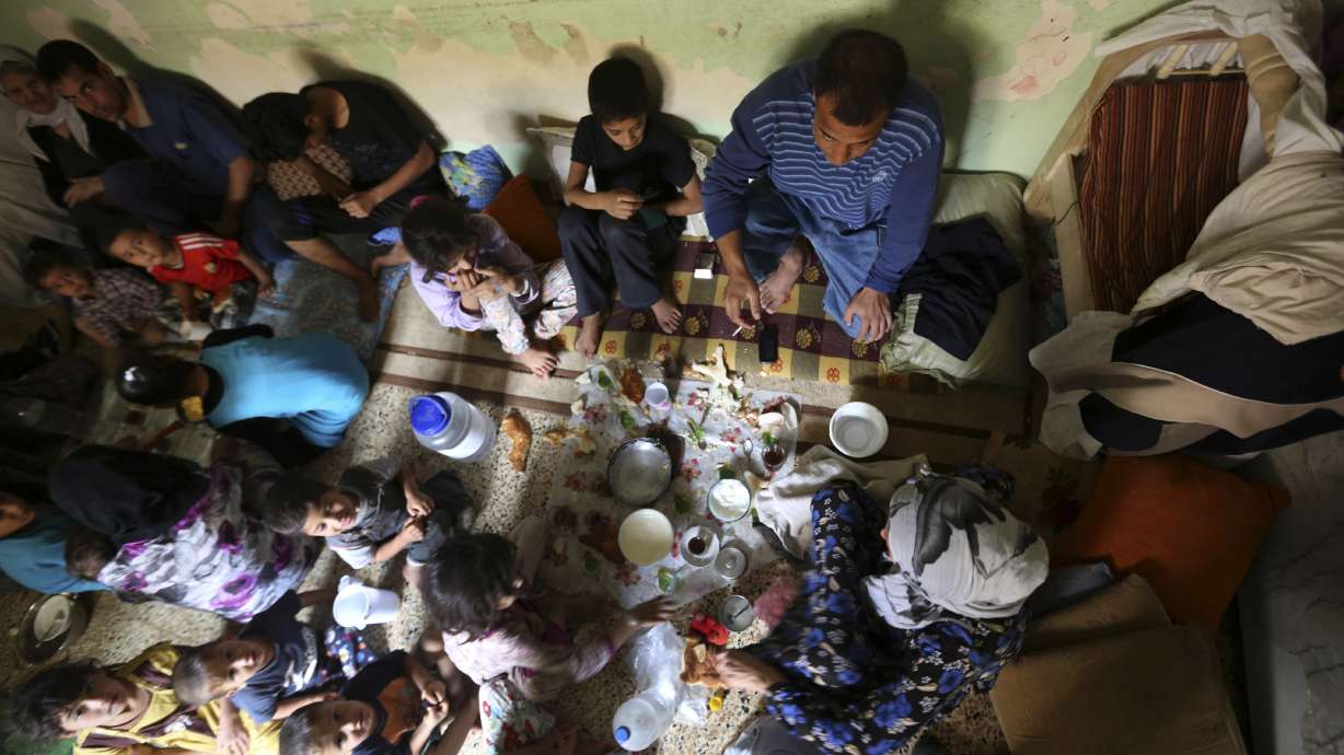 In squalid exile, Iraqi Yazidis hope for return