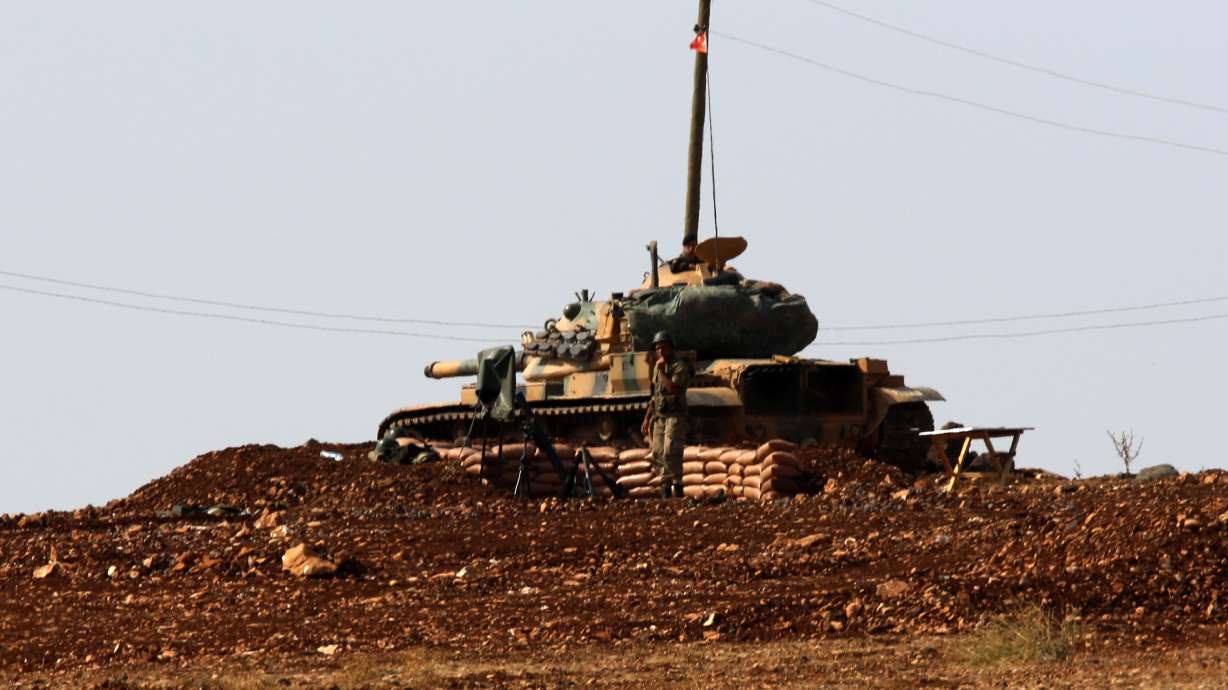 Heavy fighting hits Syrian border town