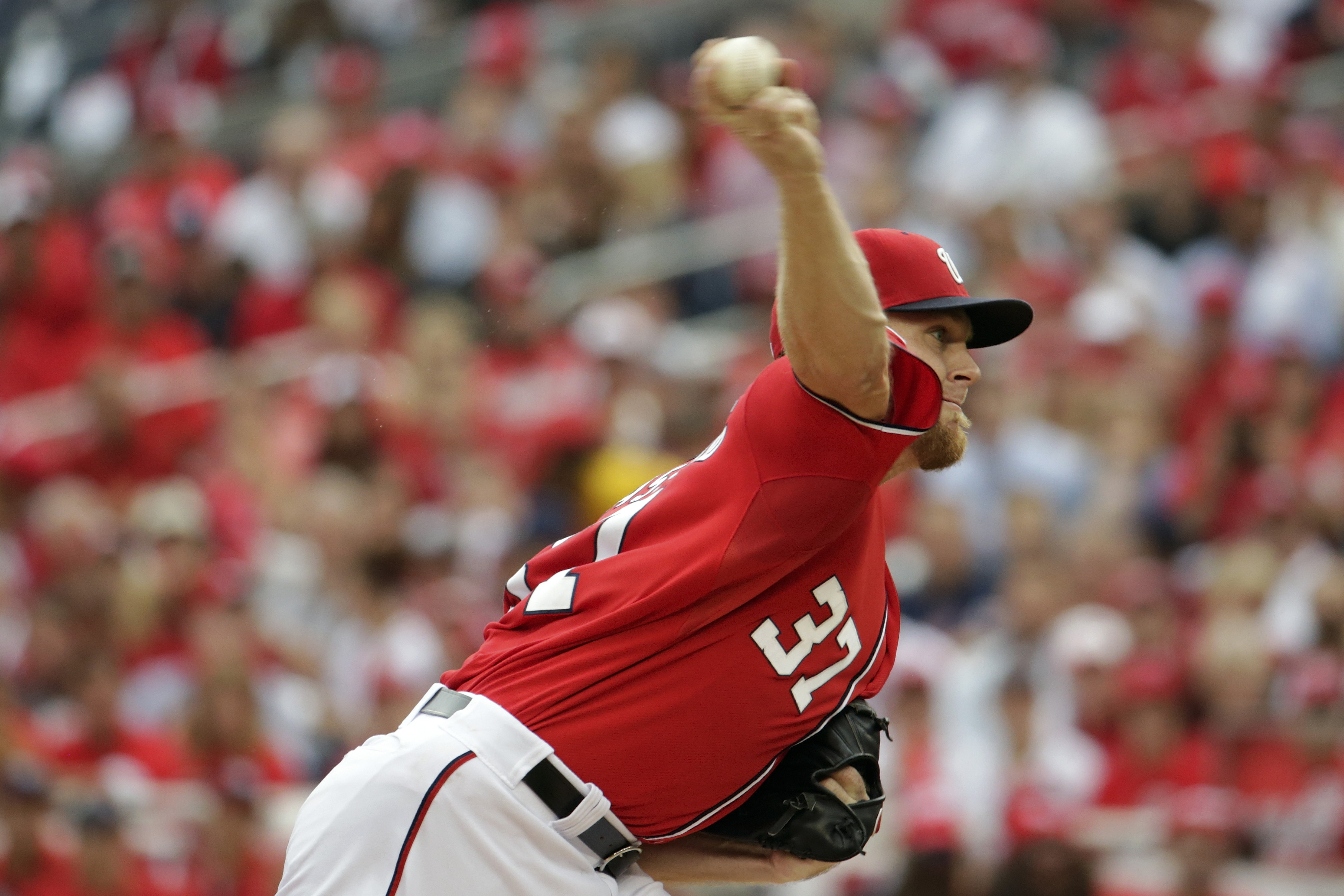 Strasburg loses playoff debut; Nats fall to Giants