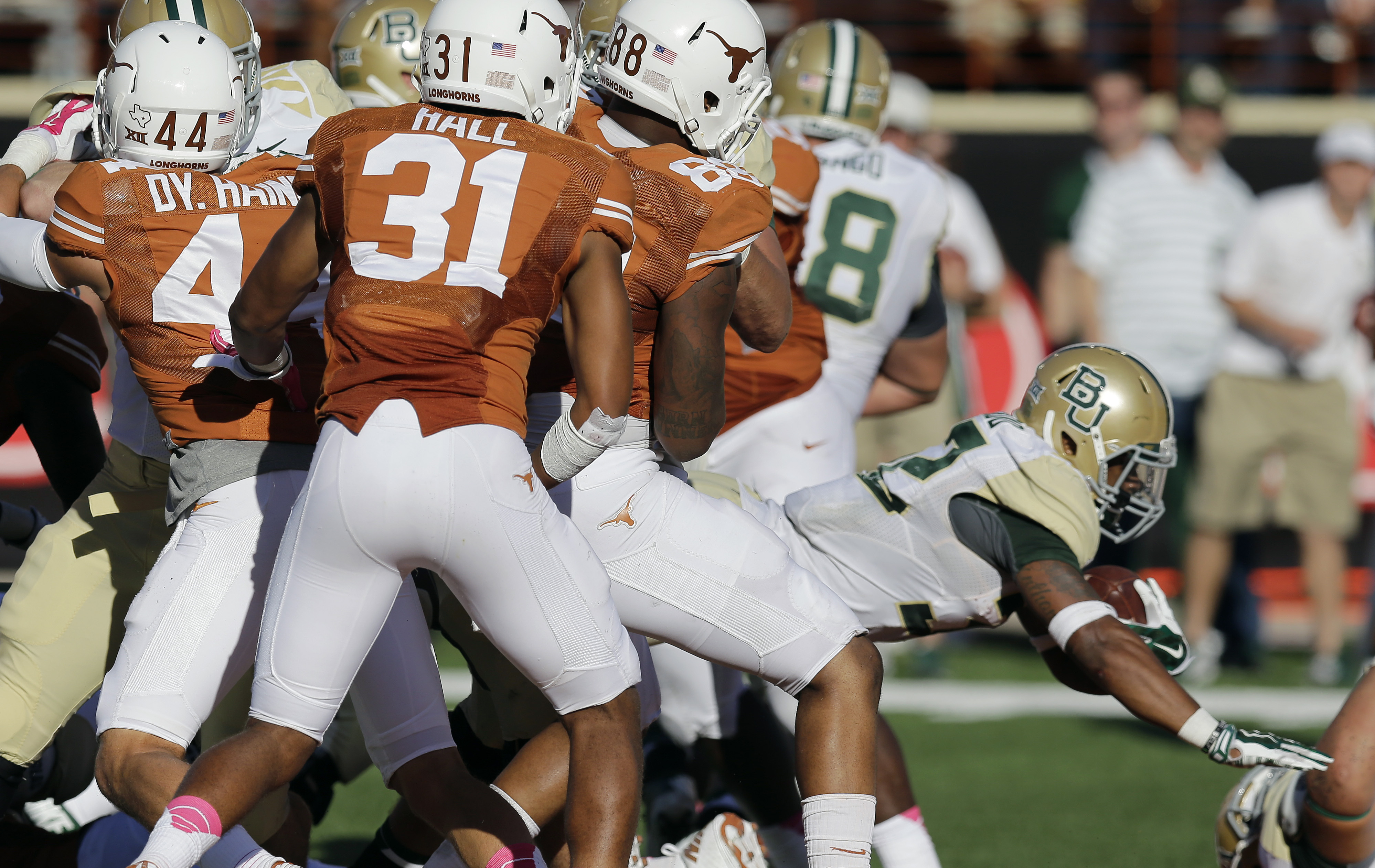 Goal line fumble costly for Texas in 28-7 loss