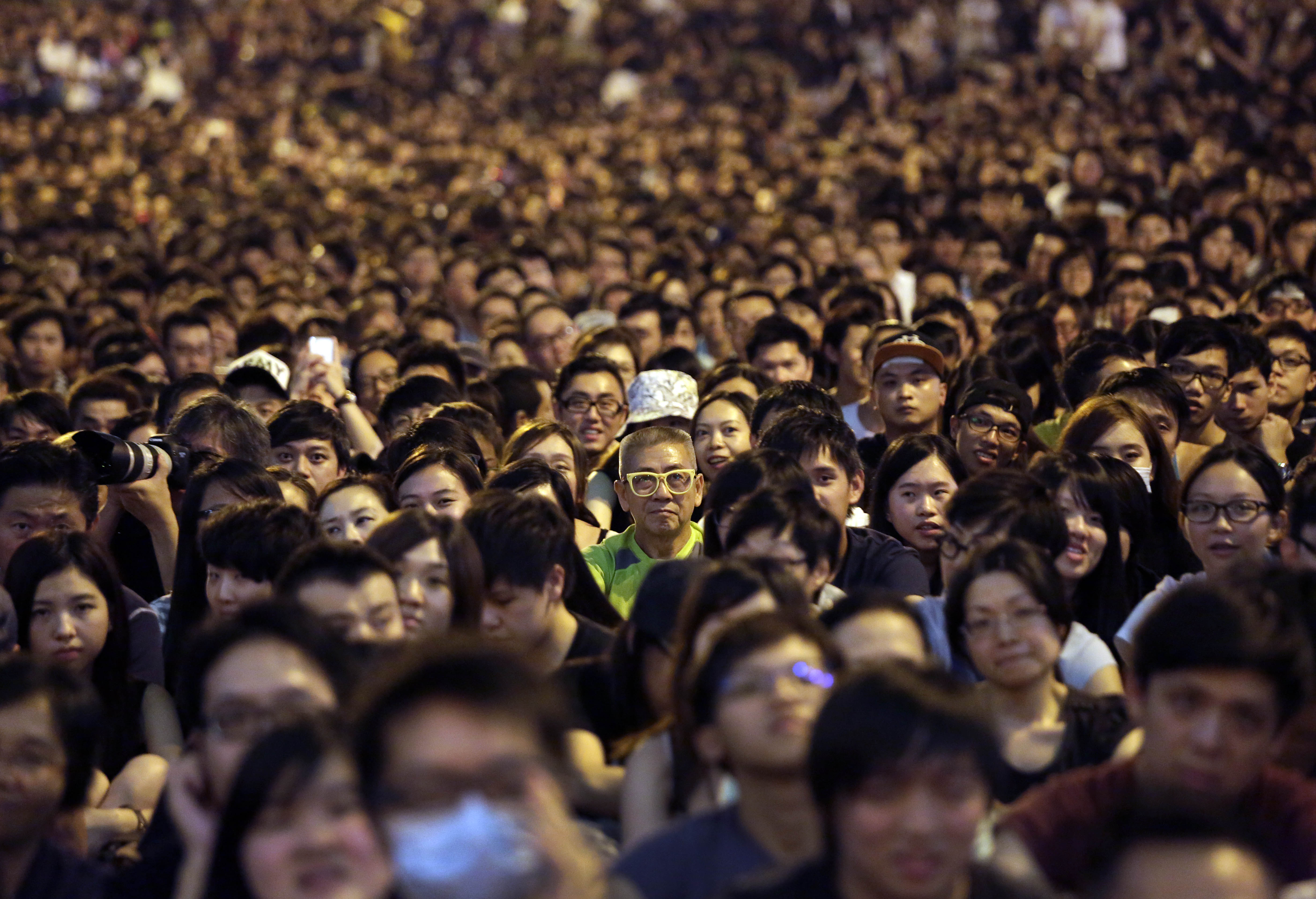 Hong Kong officials resume work as protests thin