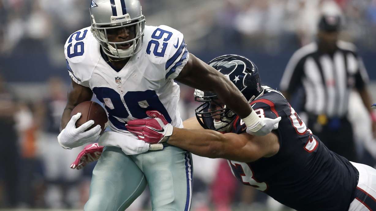 Romo, Bryant carry Cowboys past Texans 20-17 in OT