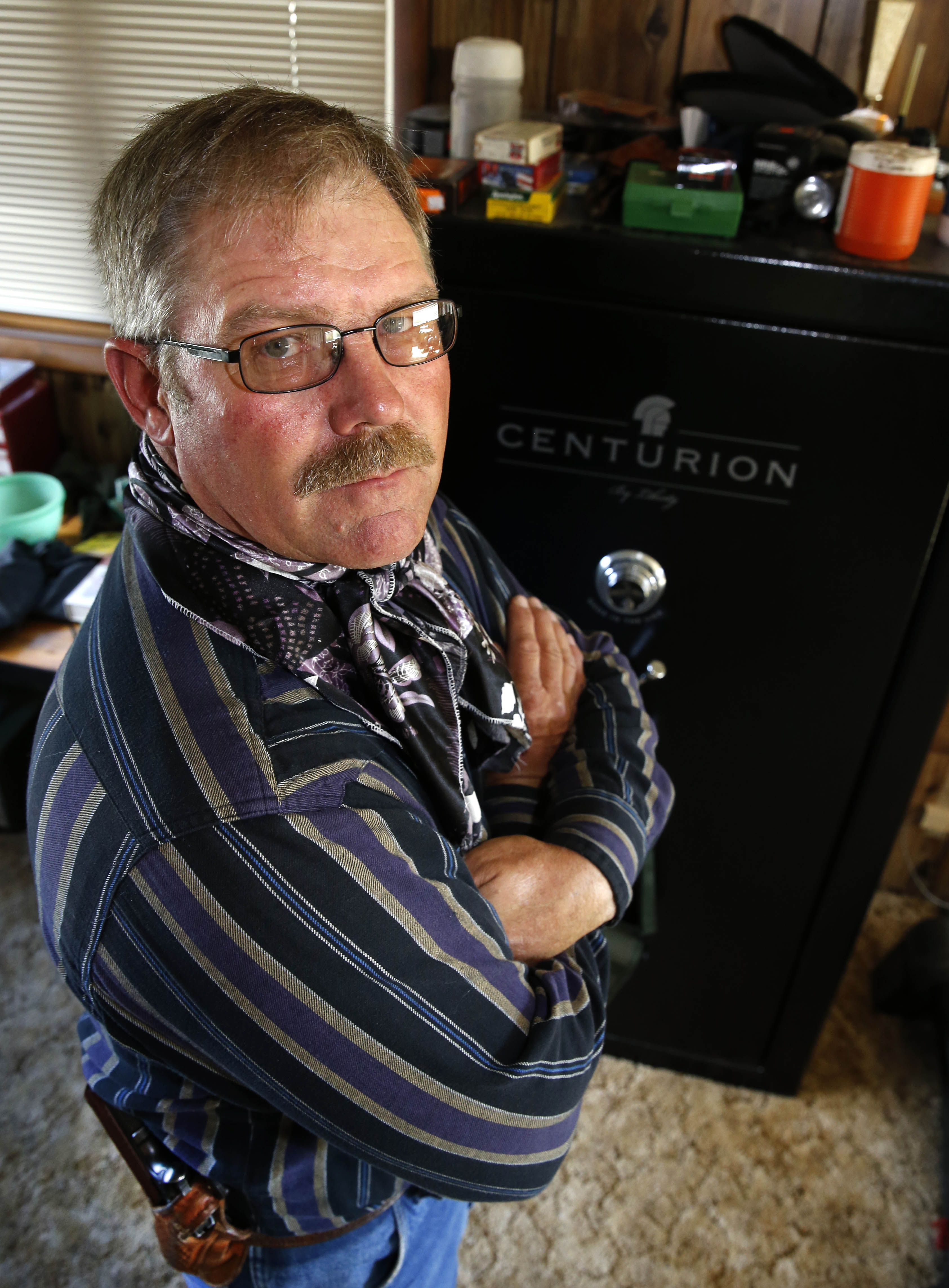 Even an Ozarks coroner gets surplus military guns