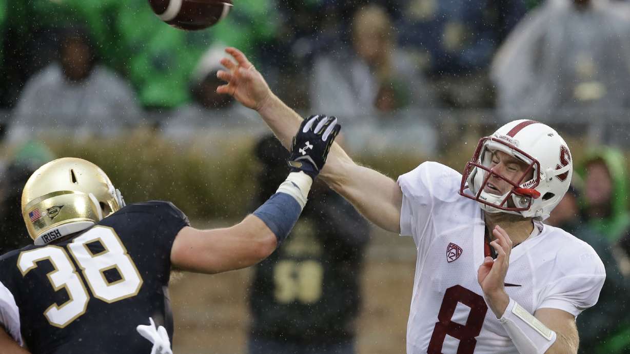 Stanford QB Kevin Hogan nursing leg injury