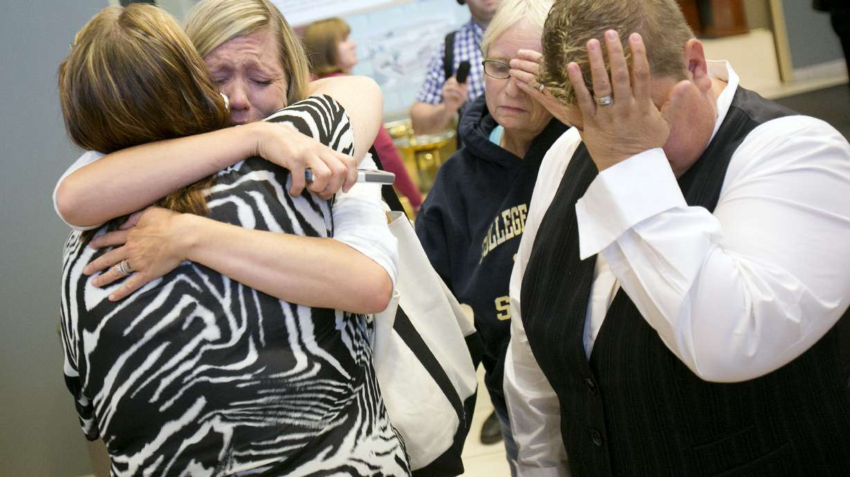 Tears, cheers as gay couples get married in Vegas