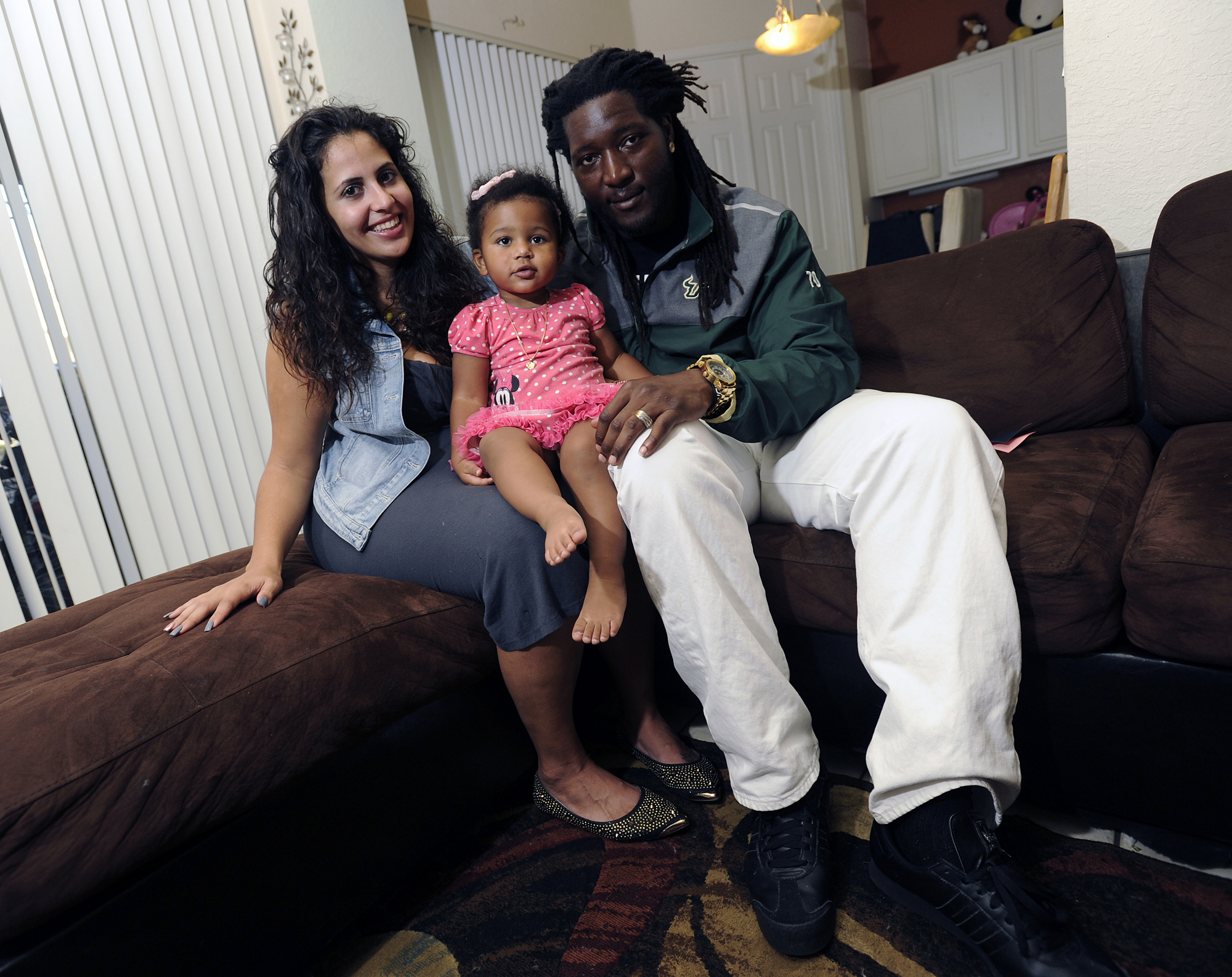 Football player's blind daughter regaining sight