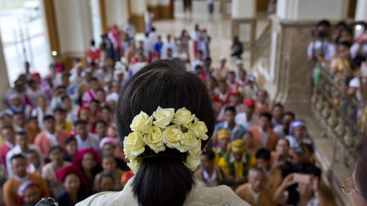 In Myanmar Parliament, colorful hats cap divisions