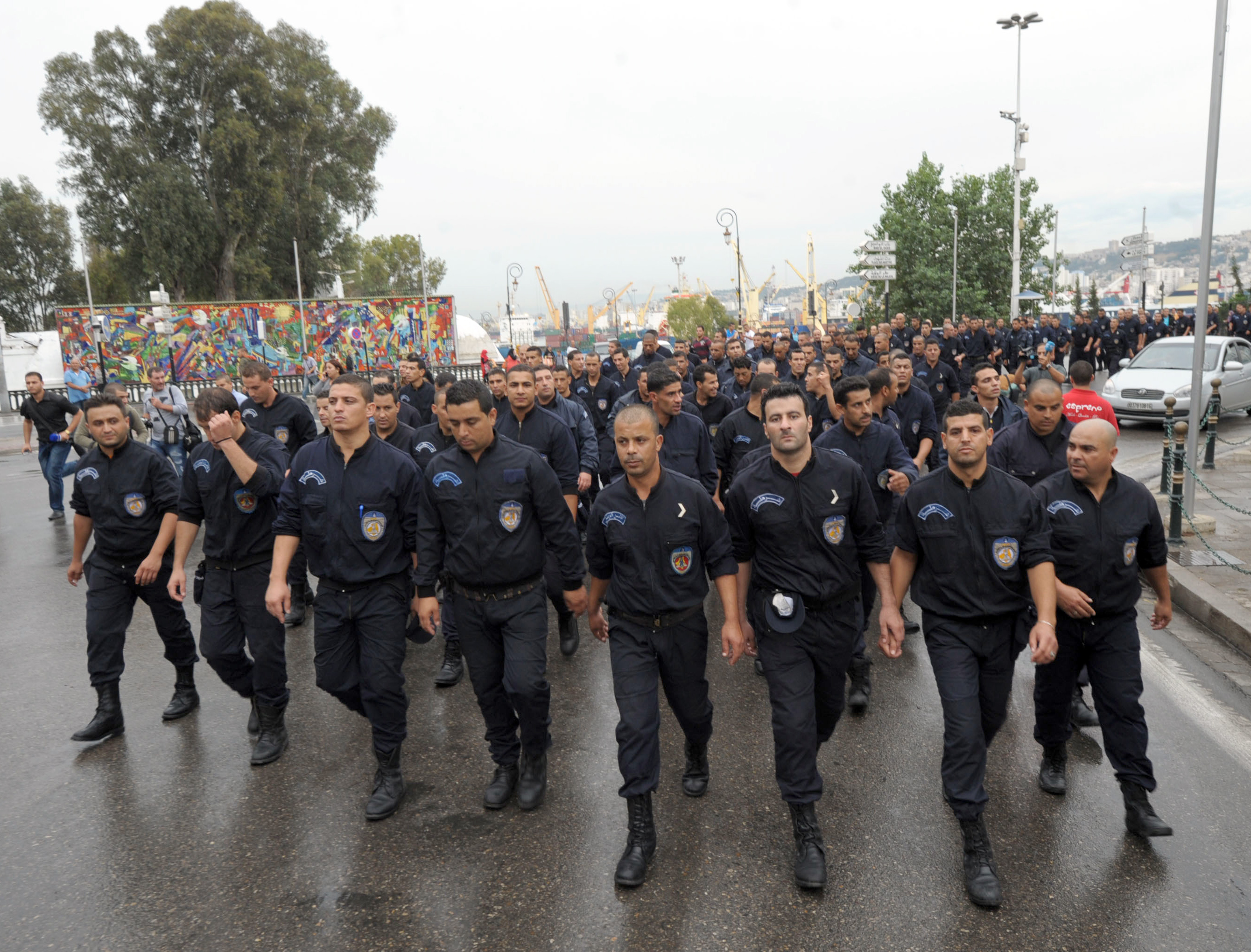 Algerian police march on president's office