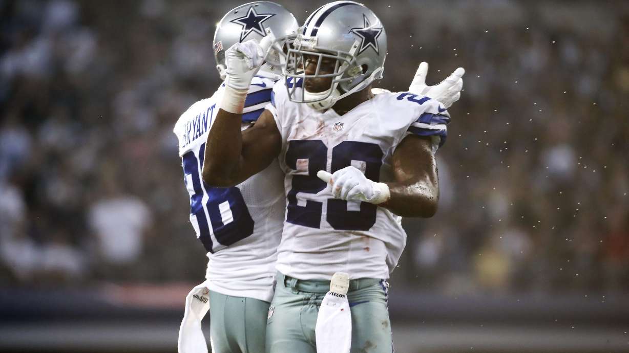 Record-setting Murray, Cowboys top Giants 31-21