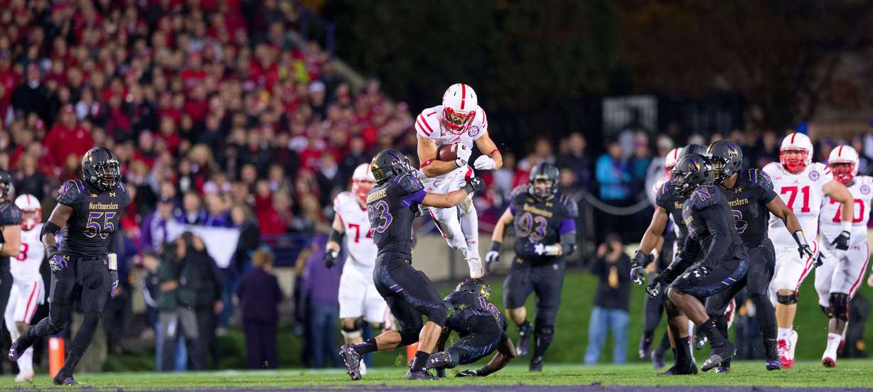 Nebraska receiver Jordan Westerkamp (1) leaps over Northwestern defender Godwin Igwebuike (16) during a game last year. (AP file photo)