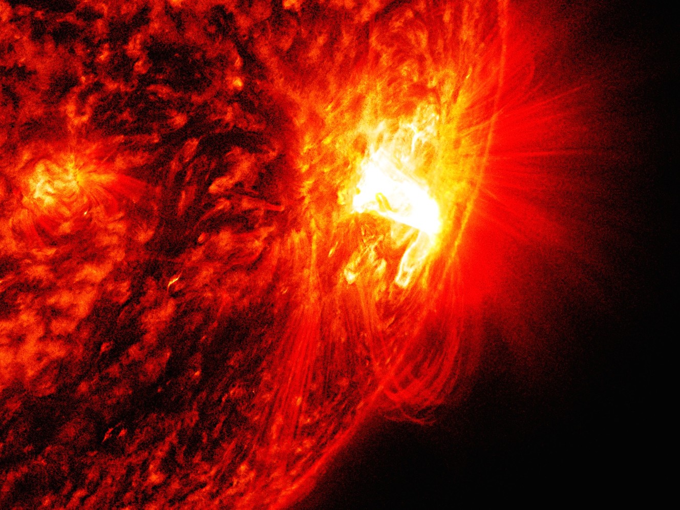 Solar flares erupt from largest sunspot in decades
