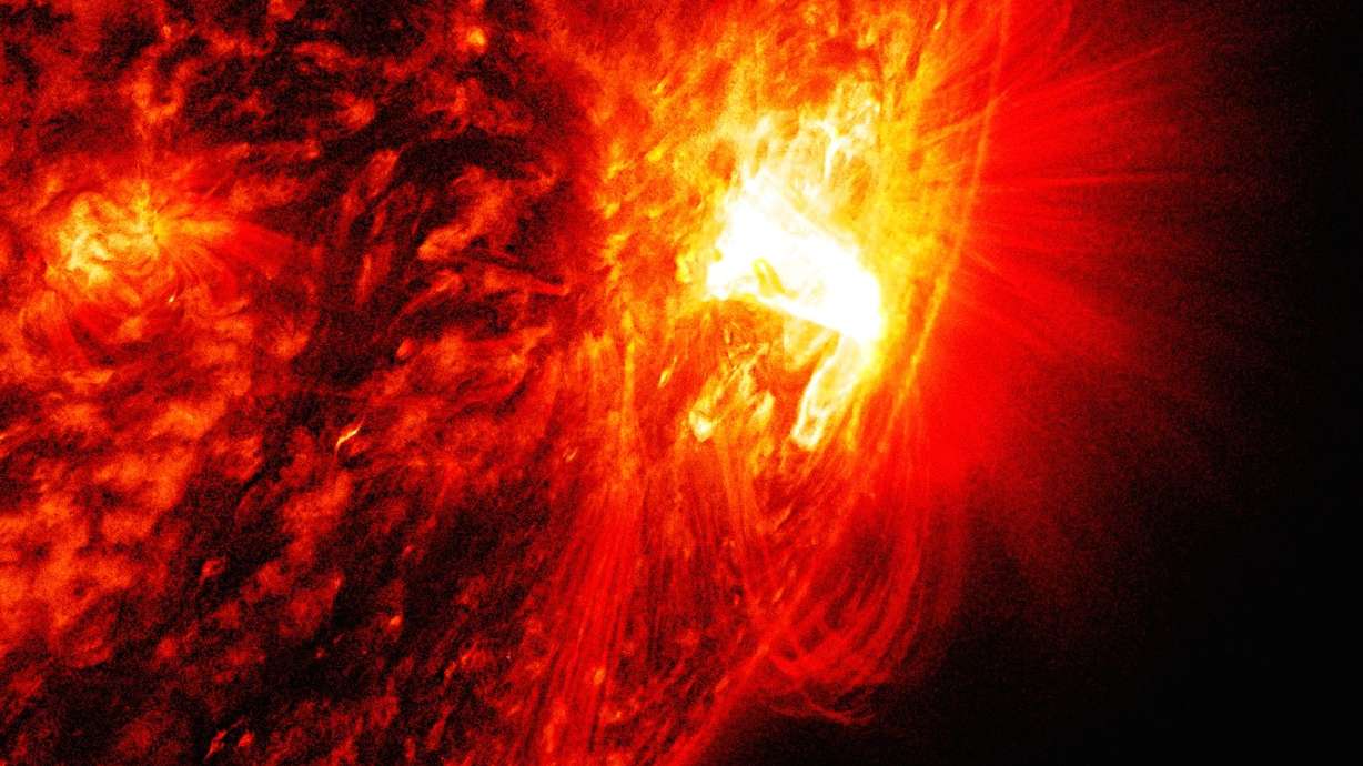 Solar flares erupt from largest sunspot in decades
