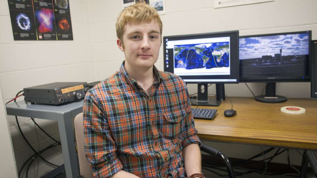 Student texts space station with rooftop antennae