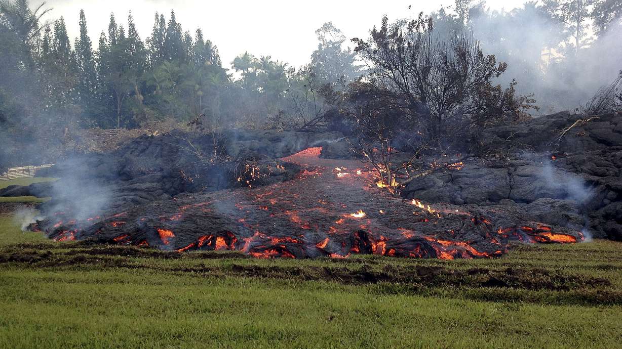 Family headstone spared by lava in Hawaii cemetery
