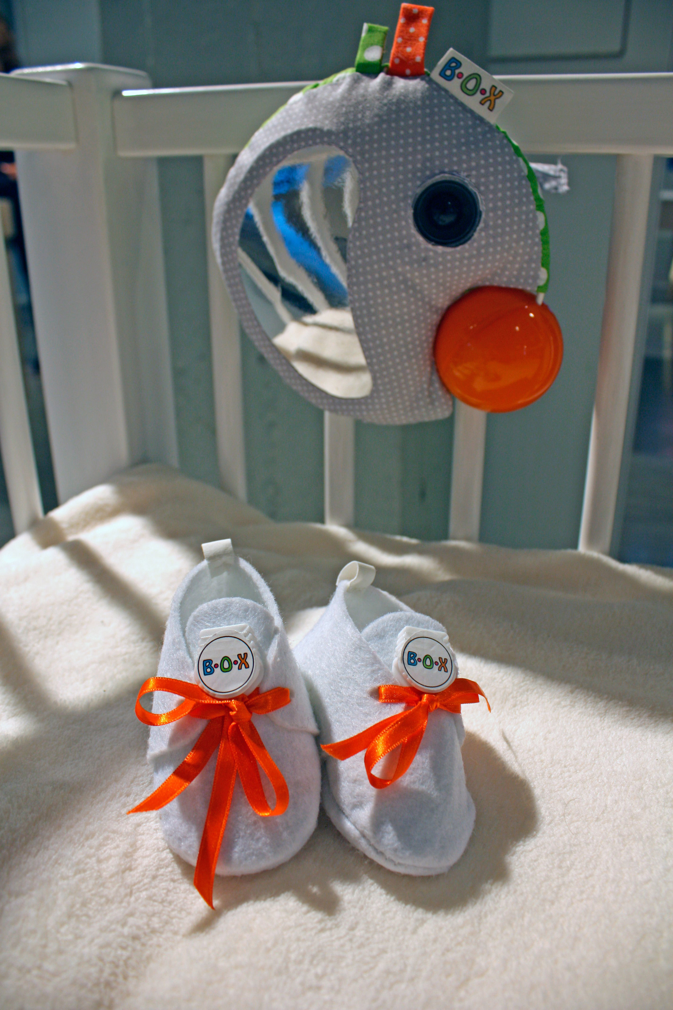These little shoes contain a GPS device that can track the baby's movement and share its location online. Photo: Laura Cornet