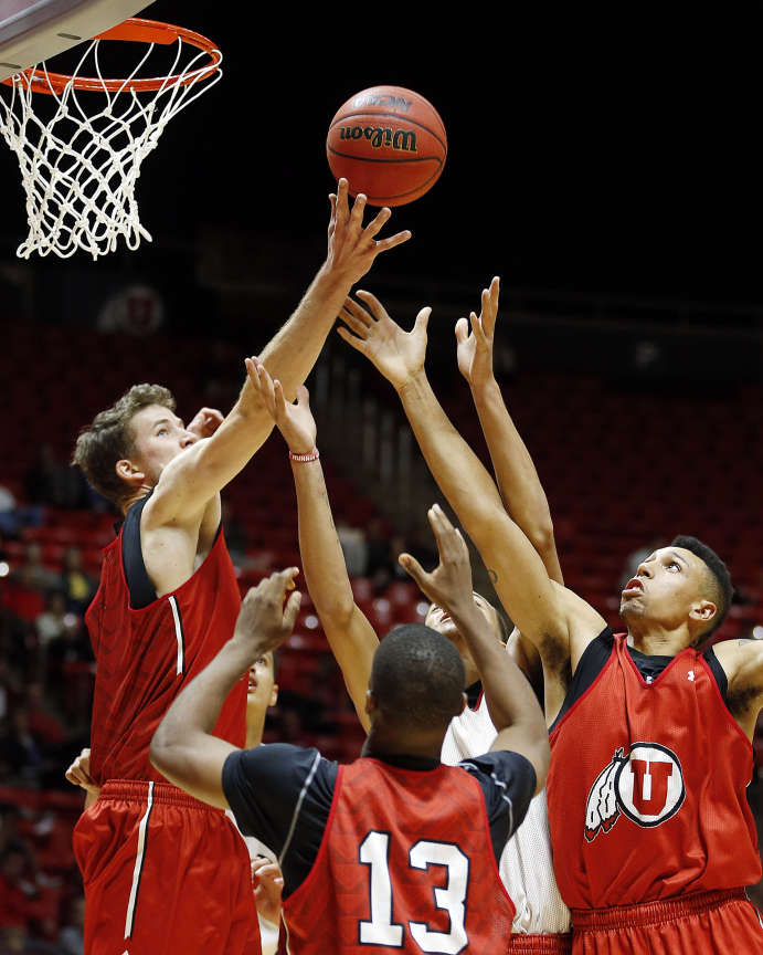 Jakob Poeltl tips the ball away from the basket during Night with the Runnin' Utes at the Huntsman Center in Salt Lake City, Tuesday, Oct. 21, 2014. (Credit: Ravell Call)