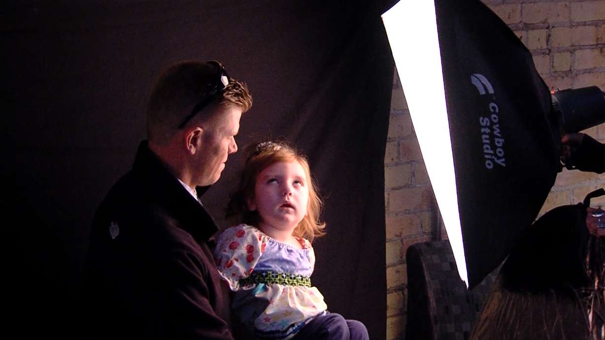 Chad McClellan's daughter, Leah, started taking hemp oil extract for her seizures two months ago. The frequency and intensity of her seizures has declined, he said.(Mike DeBernardo/KSL TV).