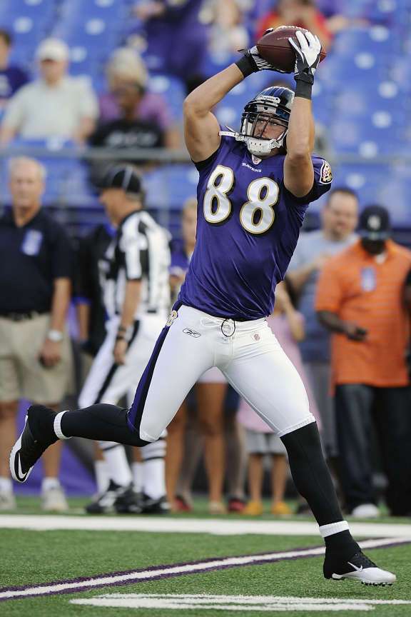Baltimore Ravens tight end Dennis Pitta warms up before a preseason NFL football game against the Kansas City Chiefs in Baltimore, Friday, Aug. 19, 2011. (AP Photo/Nick Wass)