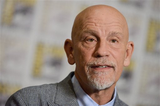 Malkovich is a phenomenal actor and is bizarre enough to make us fall in love with the crazy and disturbing villain. Malkovich has the off-putting smile and the dry delivery to bring a whole new level to the character we've yet to see. (Photo by Richard Shotwell/Invision/AP)