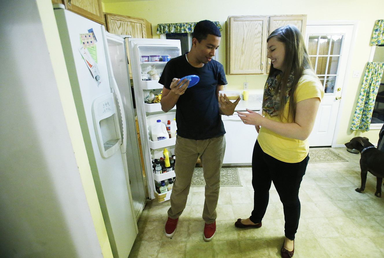 José and Shannon Sanchez fix dinner in Salt Lake City Nov 13, 2014. The couple live with Shannon's mother and have applied for a grant through Wells Fargo that will go toward a down payment for their own home. (Photo: Jeffrey D. Allred, Deseret News)