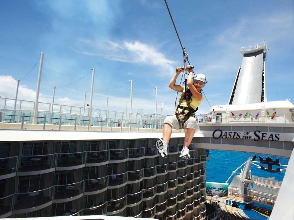 The Oasis of the Seas has 25 restaurants, 2,394 crew members and seven themed "neighborhoods." It's zip line is suspended nine decks high and runs 82 feet across the ship's open-air atrium. (Courtesy Royal Caribbean)