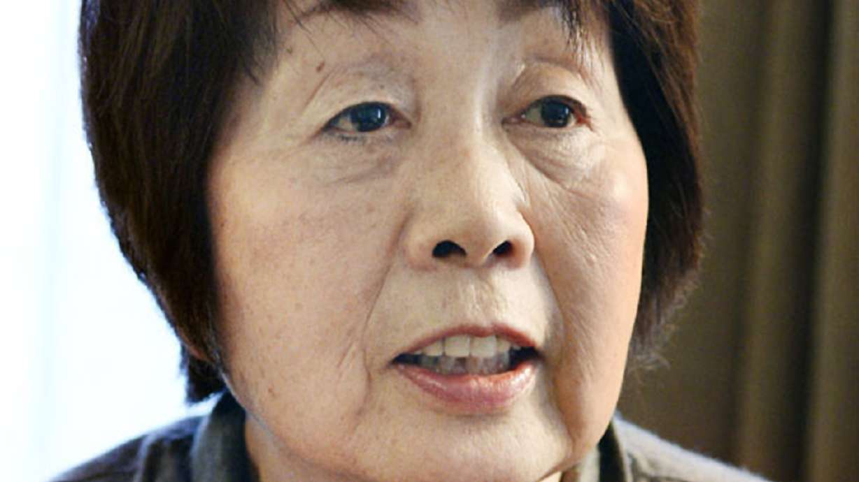 Japan police comb suspected spouses killer's home