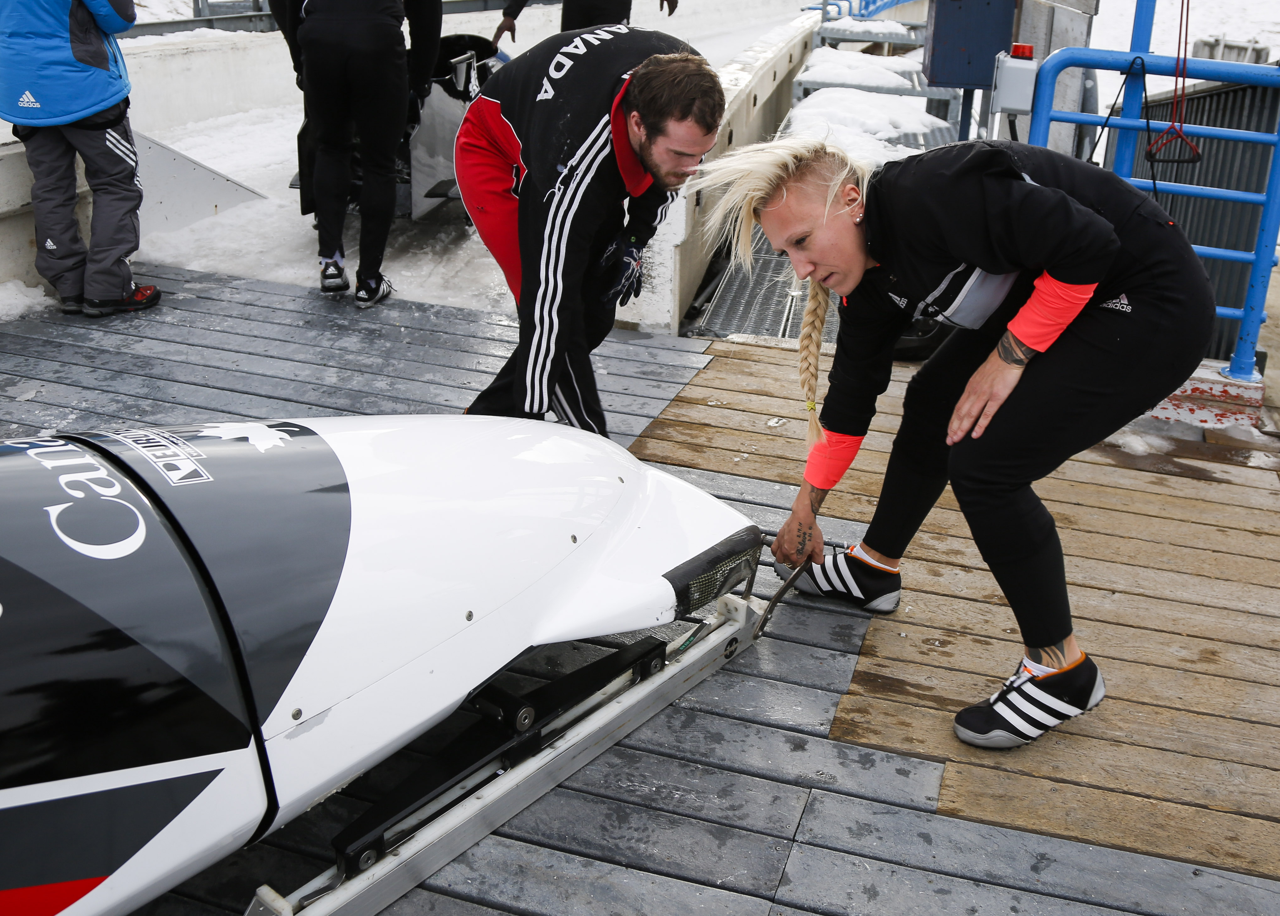 Champion female bobsledder awaits male crew