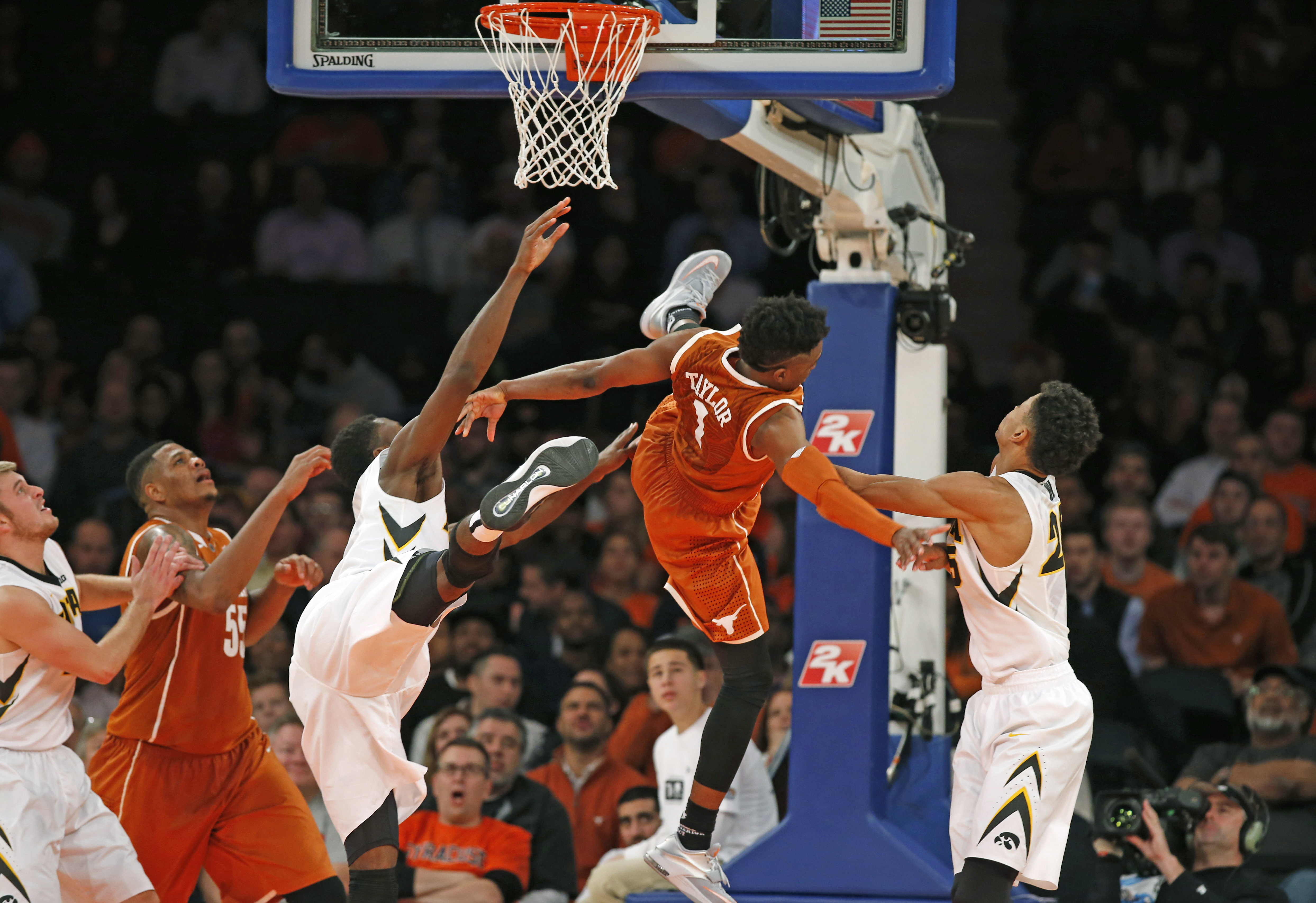 No. 10 Texas top scorer Taylor out (wrist injury)