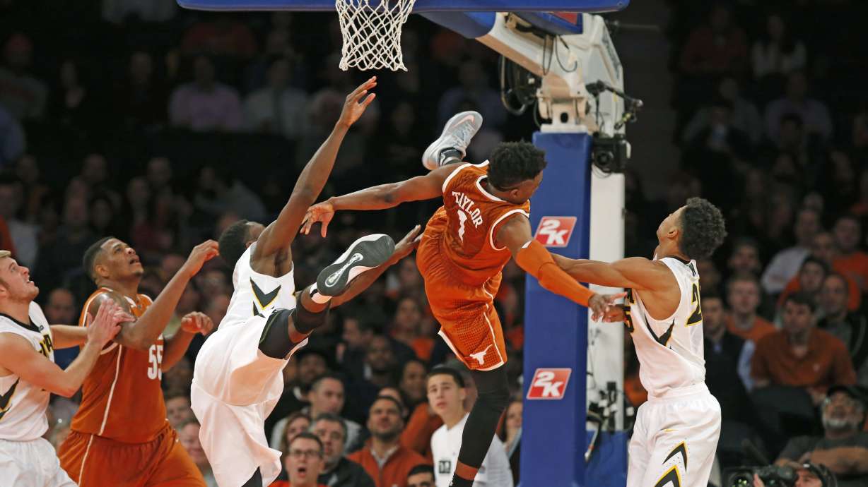 No. 10 Texas top scorer Taylor out (wrist injury)