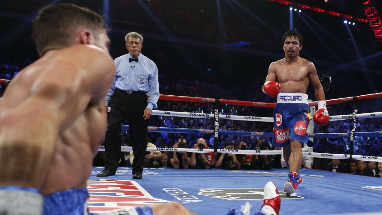 Pacquiao knocks Algieri down 6 times, dominates